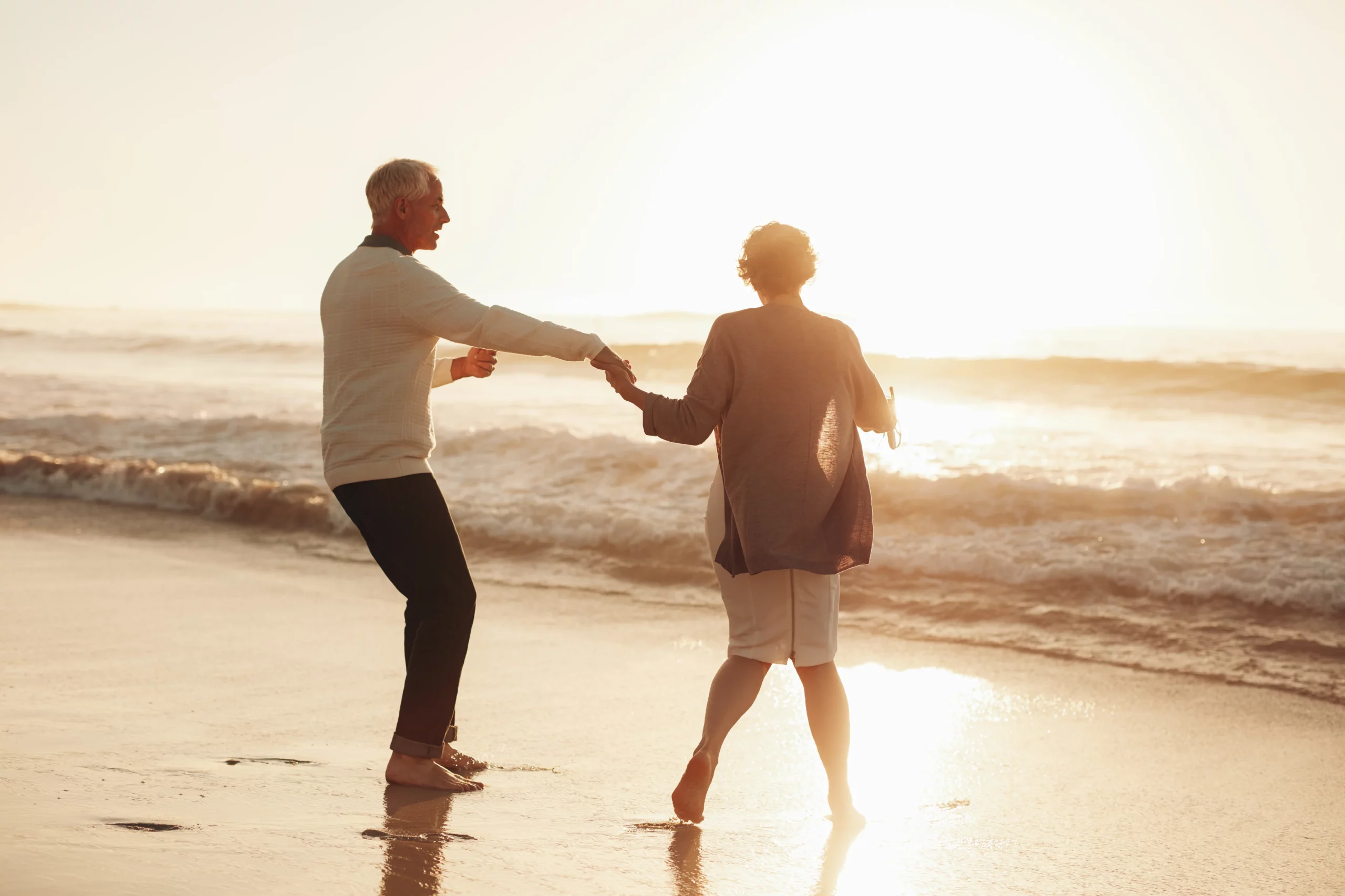 Senior couple having fun at the beach