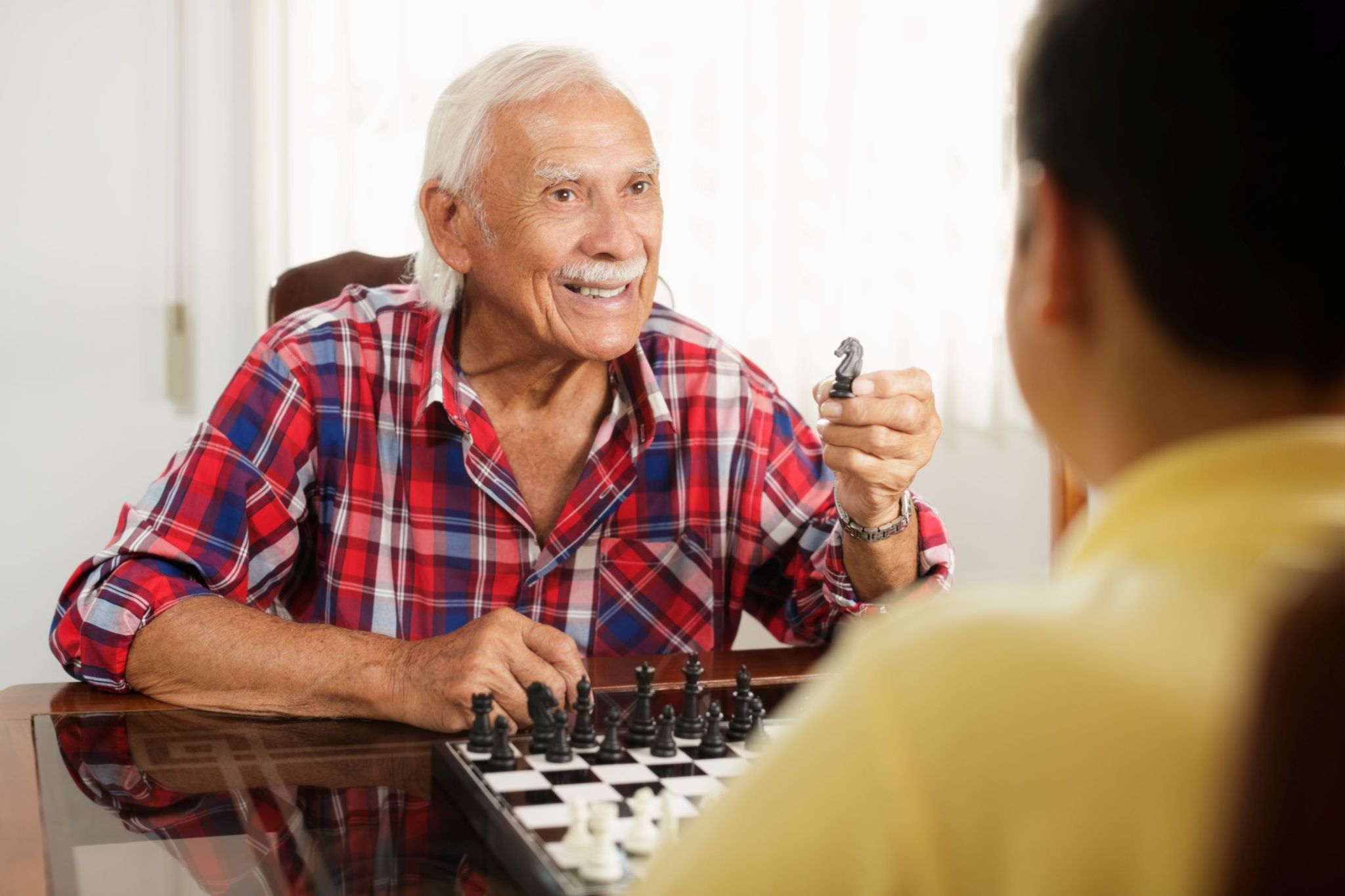 grandfather-and-grandson-playing-chess