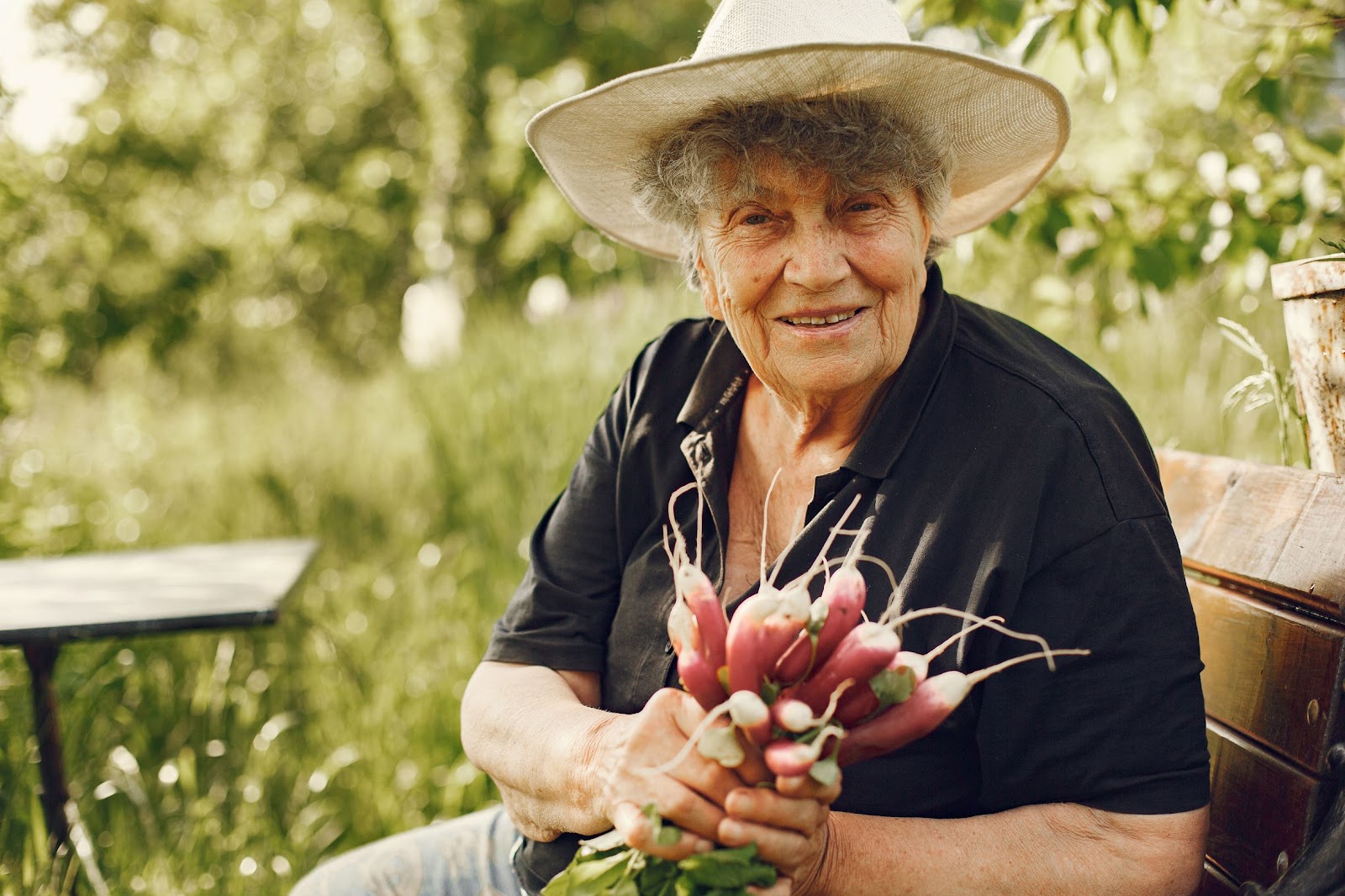 old-woman-holding-freshly-picked-radishes