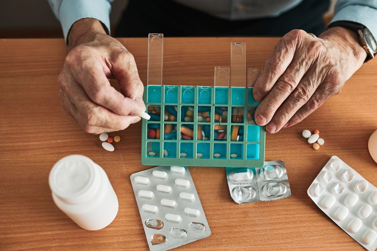 senior-man-organizing-his-medications