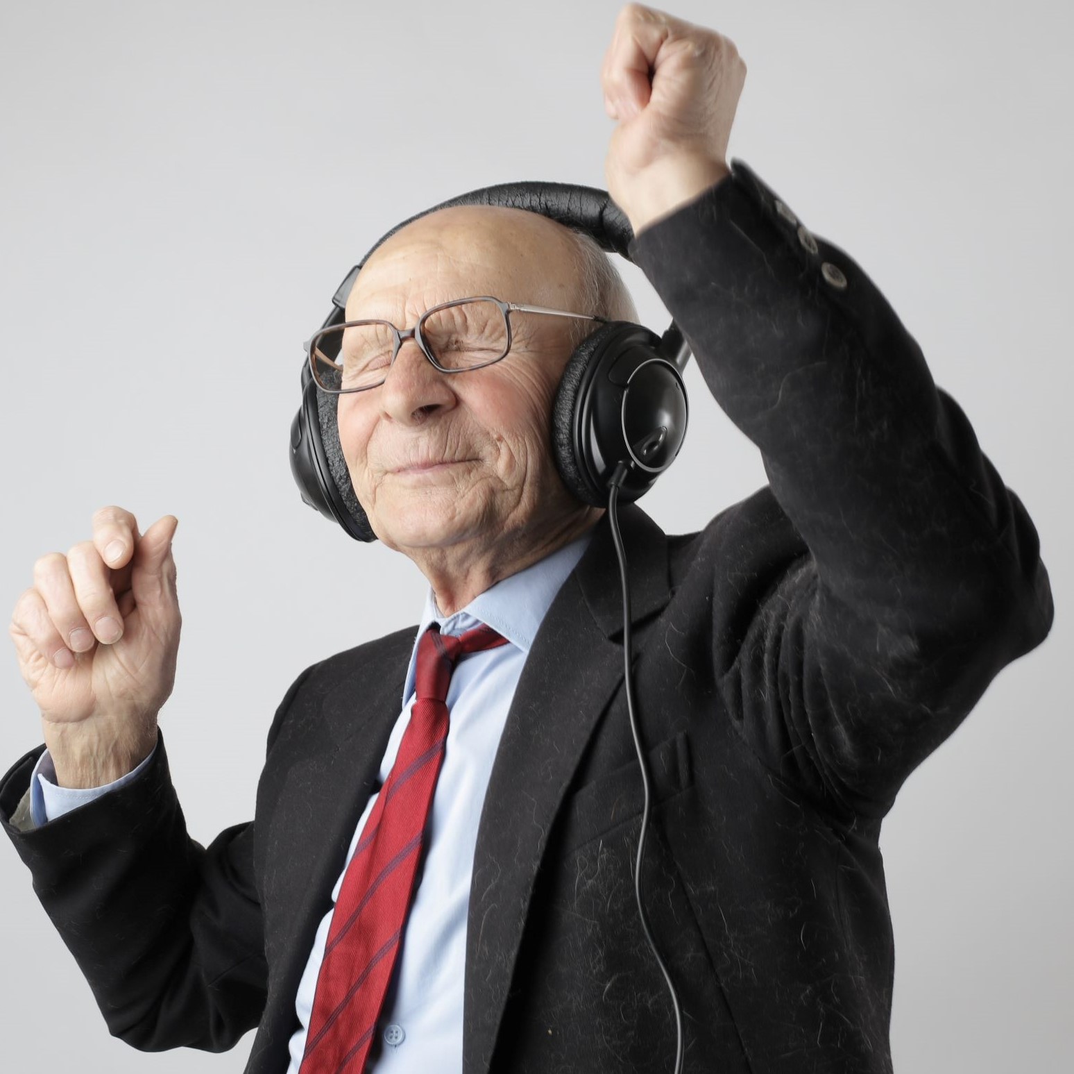 A senior man dancing because it's good for his heart