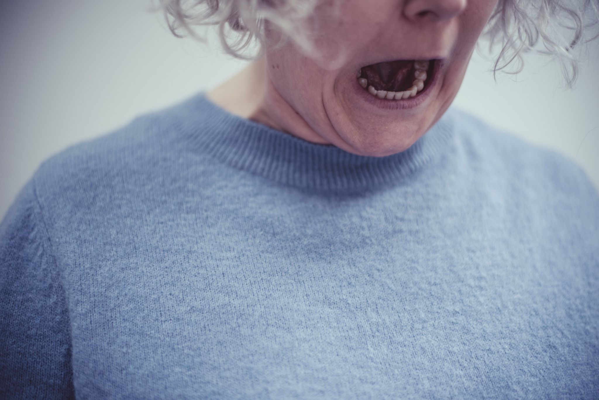 older-woman-screaming-in-anger