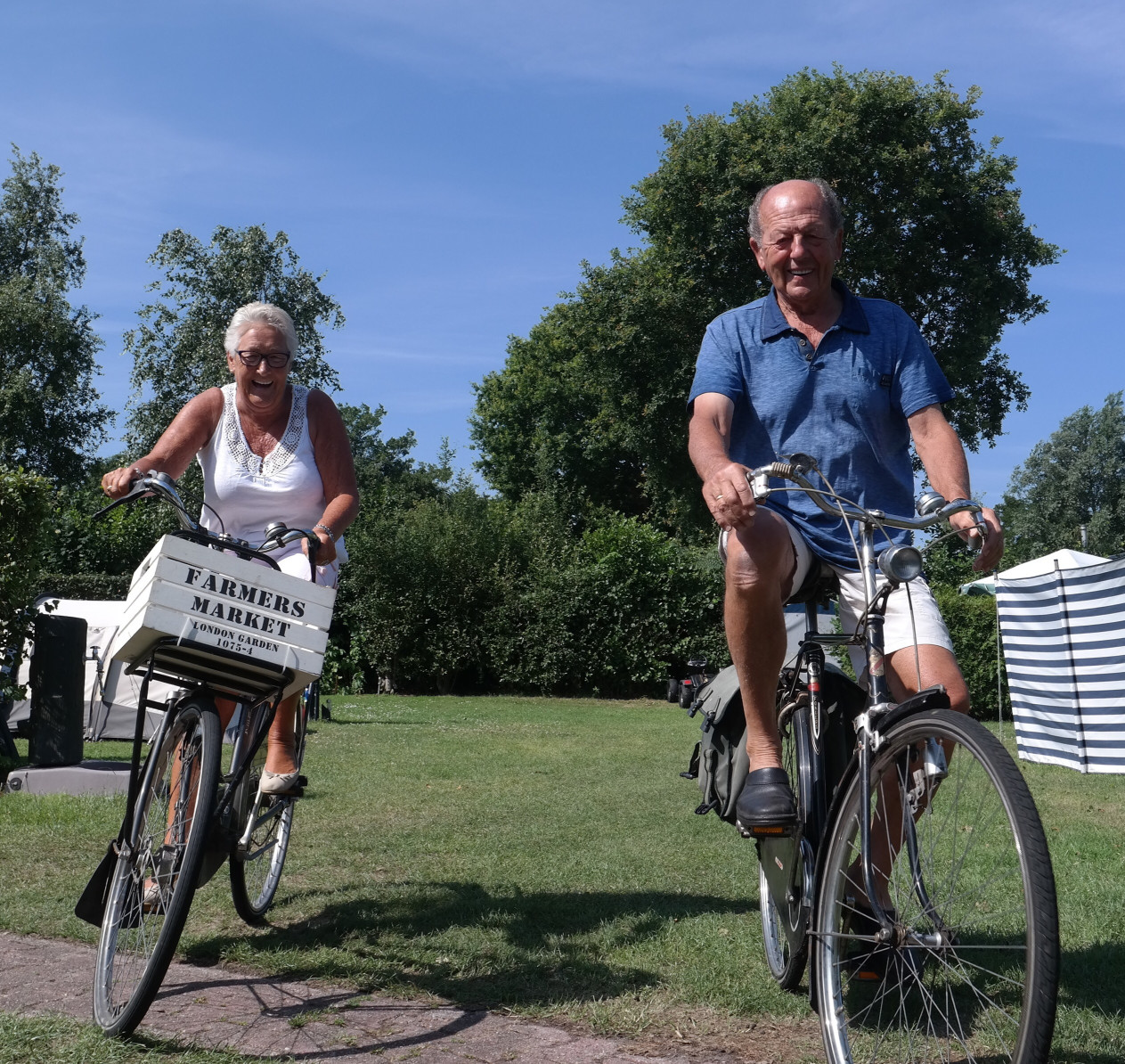 older-woman-and-man-riding-bikes