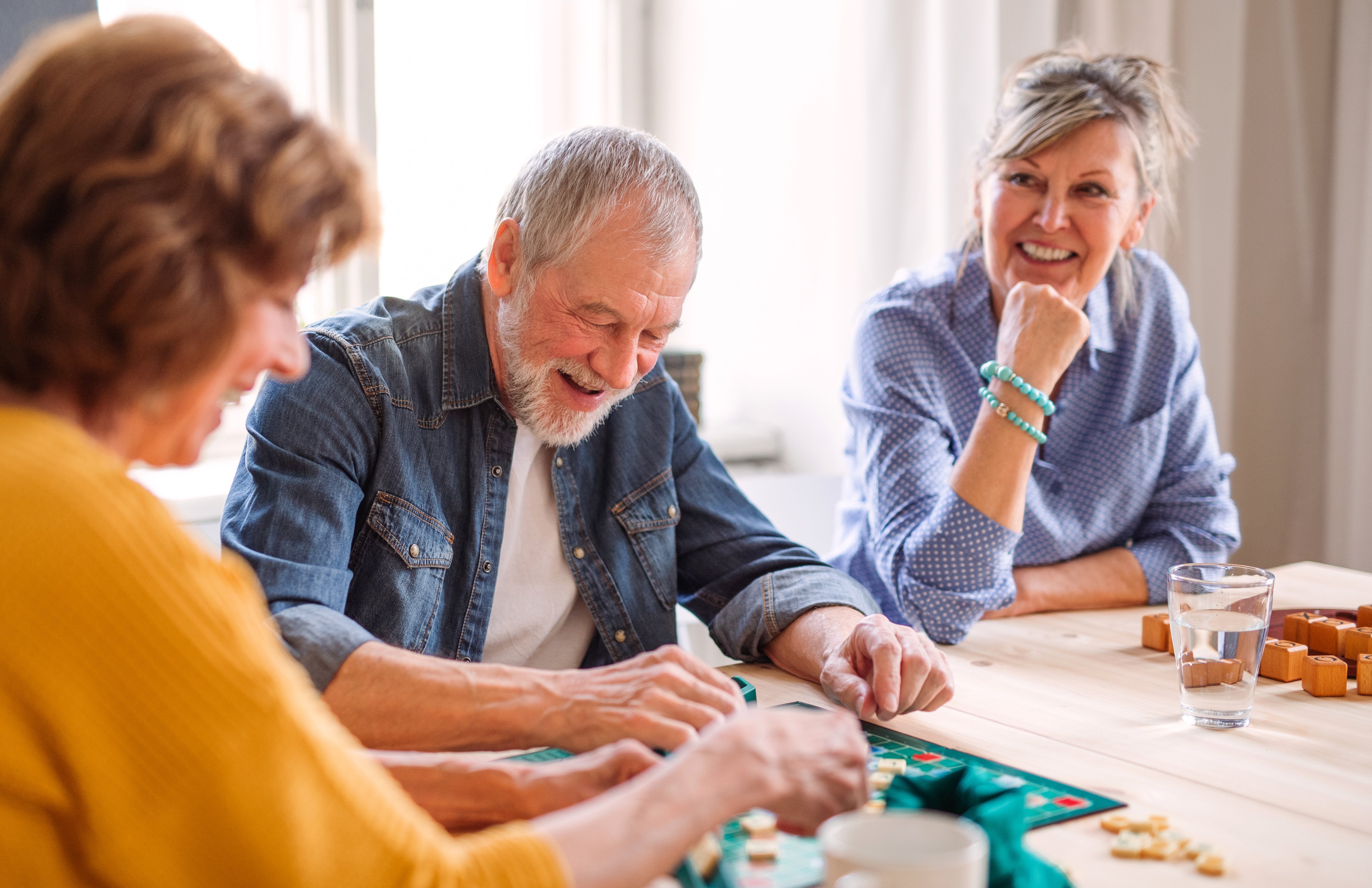 group-of-senior-people-playing-board-games-