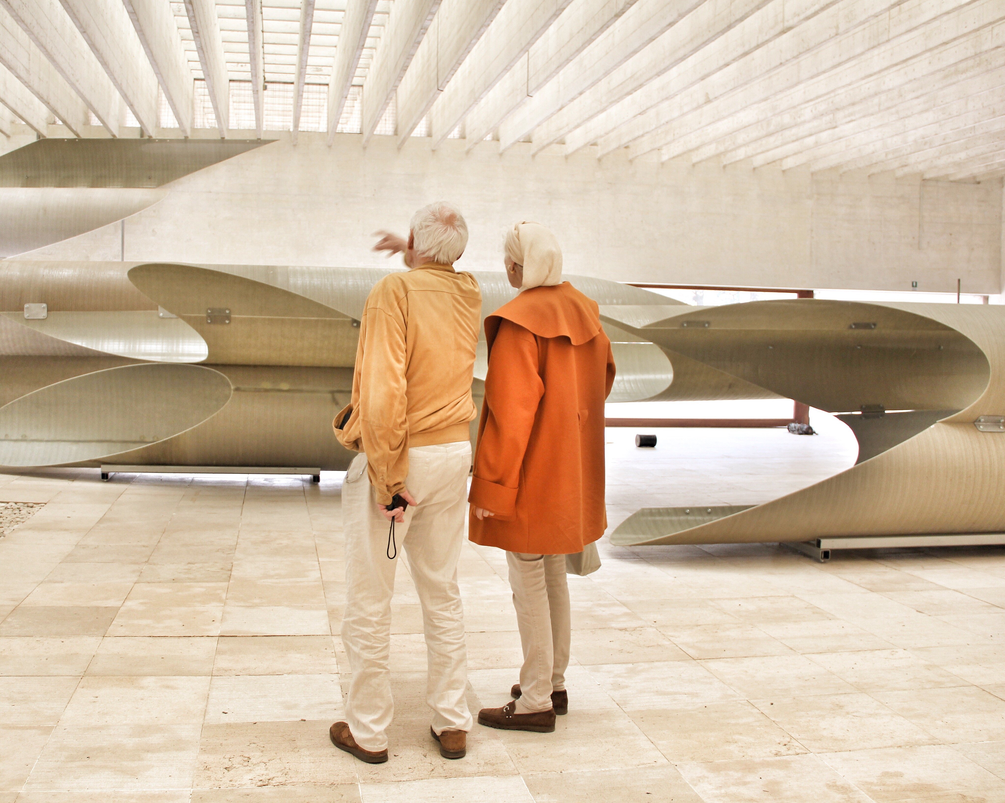 two-seniors-visiting-an-art-exhibit