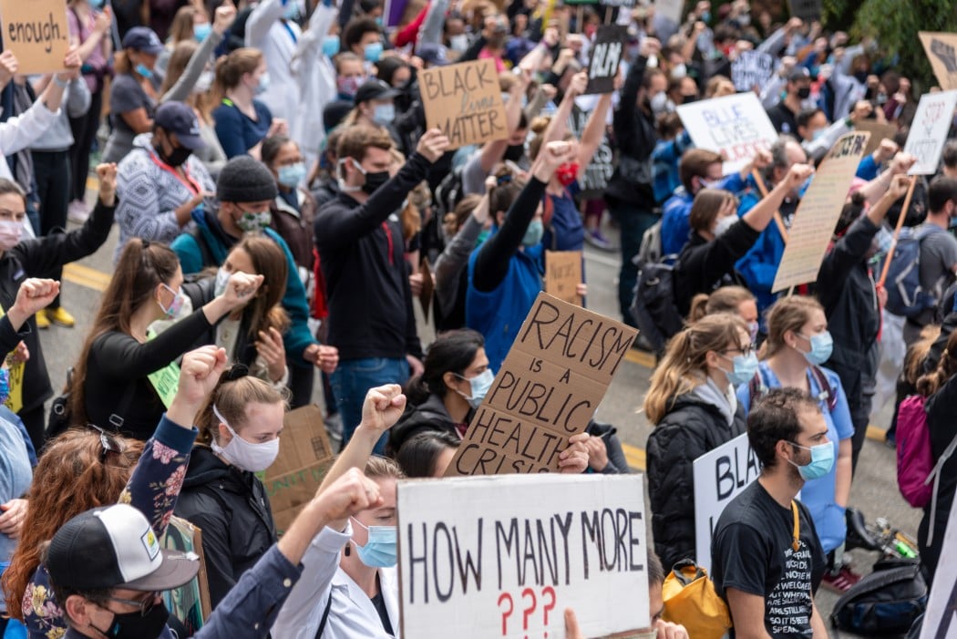 white-coats-for-black-lives-march-in-downtown-seattle-washington-with-many-diverse-health-care_t20_nLm1gP